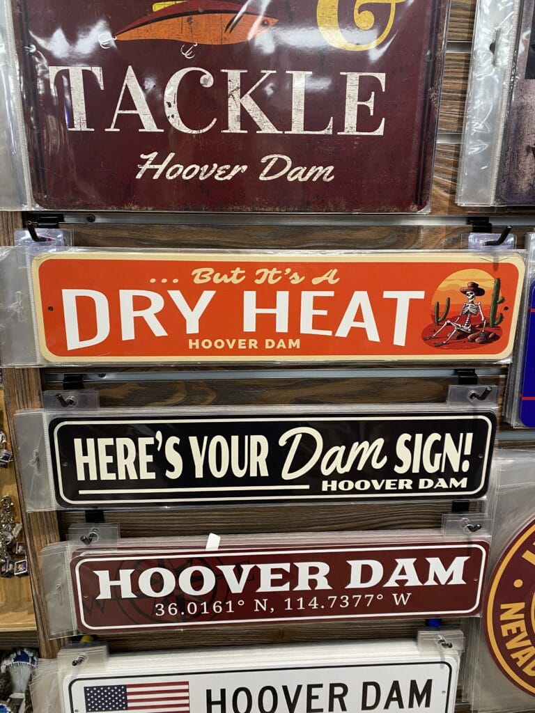 Hoover Dam Signs on Arizona Epic Family Road Trip - But it's a Dry Heat  - Here's Your Dam Sign